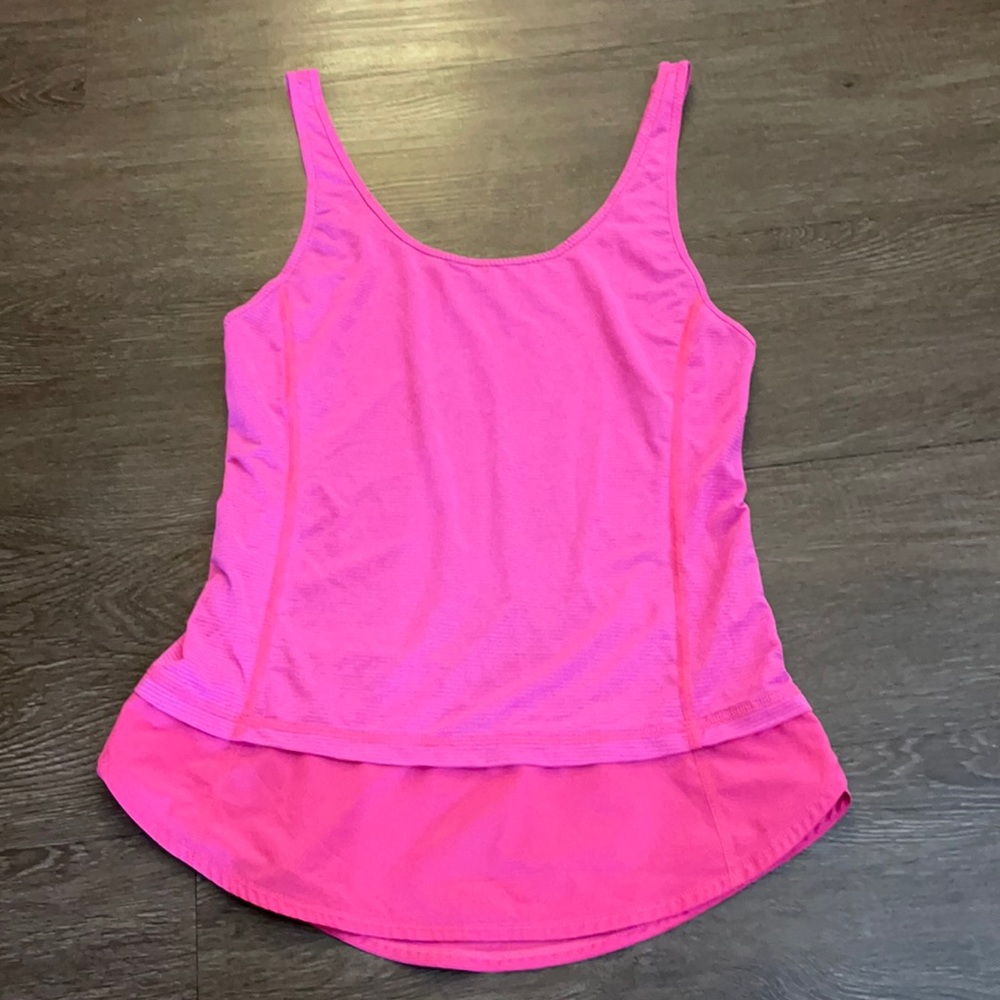Lululemon hot pink tank with ruffle bottom